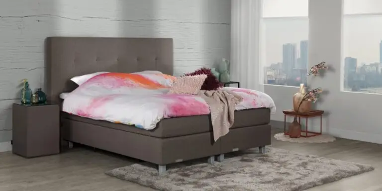 Boxspring Caresse 9750 in grijze stof met hoofdbord en twee matrassen, beschikbaar in verschillende maten tot 200x210 cm