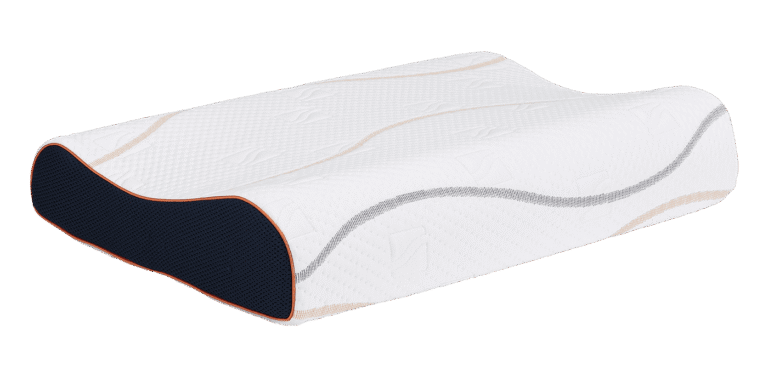 Hoofdkussen M-Line Wave Pillow met ergonomisch ontwerp en witte hoes op een bed