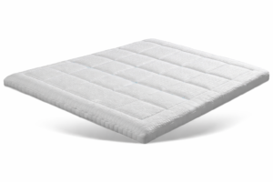 Norma T2250 Gelfoam topper met Naturalis Gel kern op een bed, biedt drukverlaging en aanpassing aan lichaam contouren.
