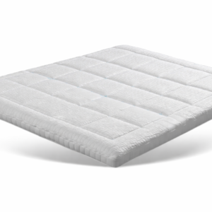 Norma T2250 Gelfoam topper met Naturalis Gel kern op een bed, biedt drukverlaging en aanpassing aan lichaam contouren.